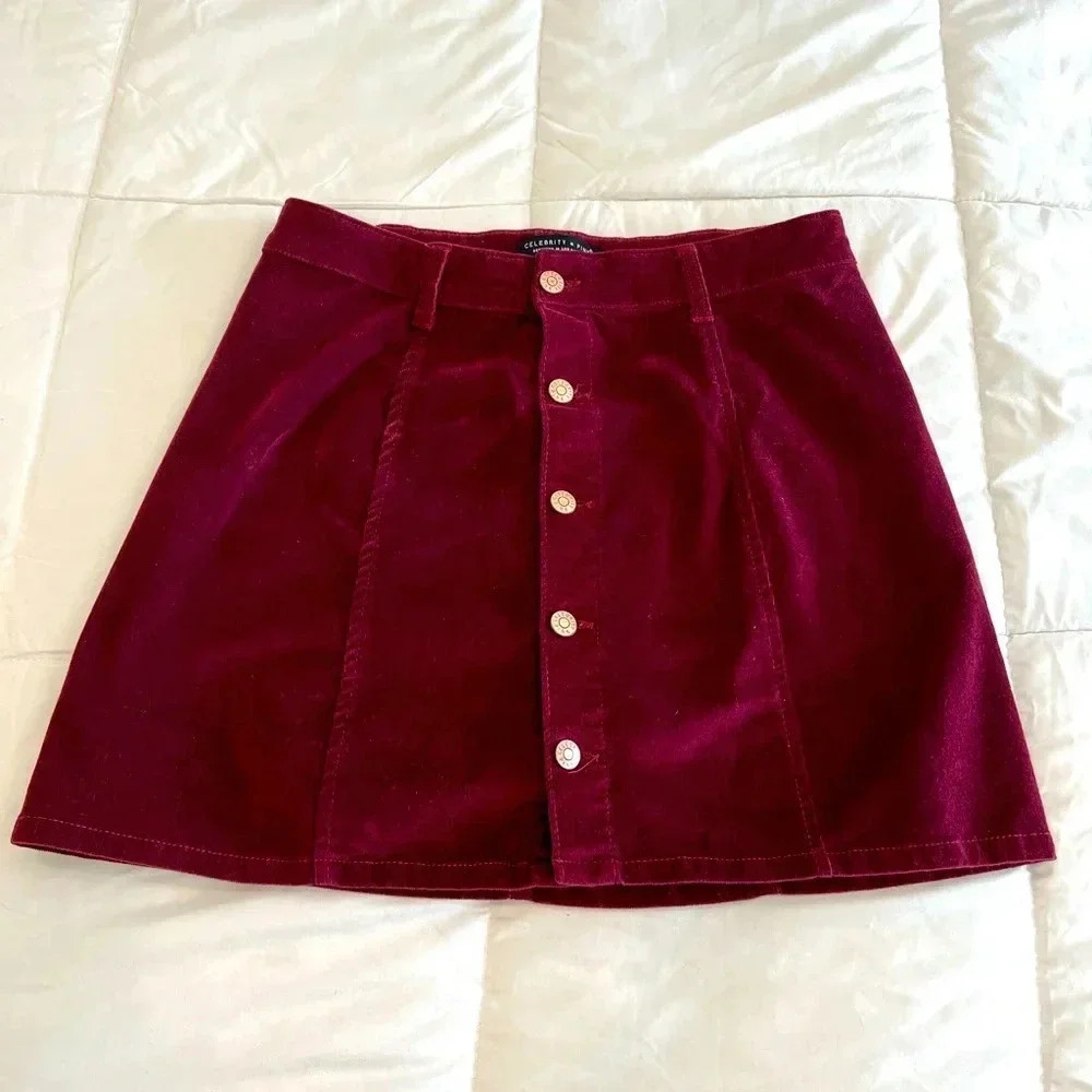 Burgundy velour mini, gold buttons, sz9. Great with tights and boots! On trend!​